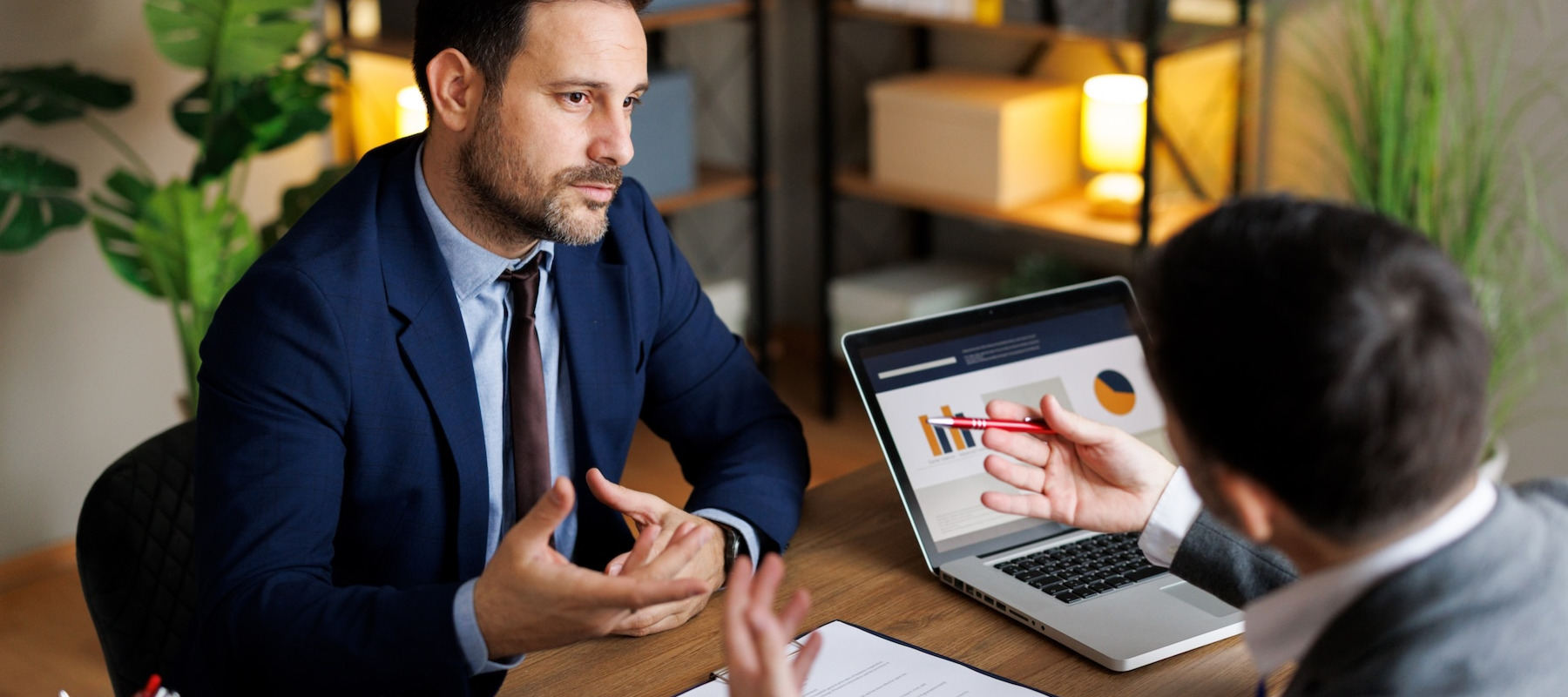Financial advisor talking to his client.