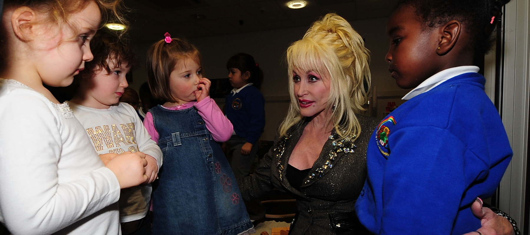Dolly Parton meets young children at the Magna Science And Adventure Park.