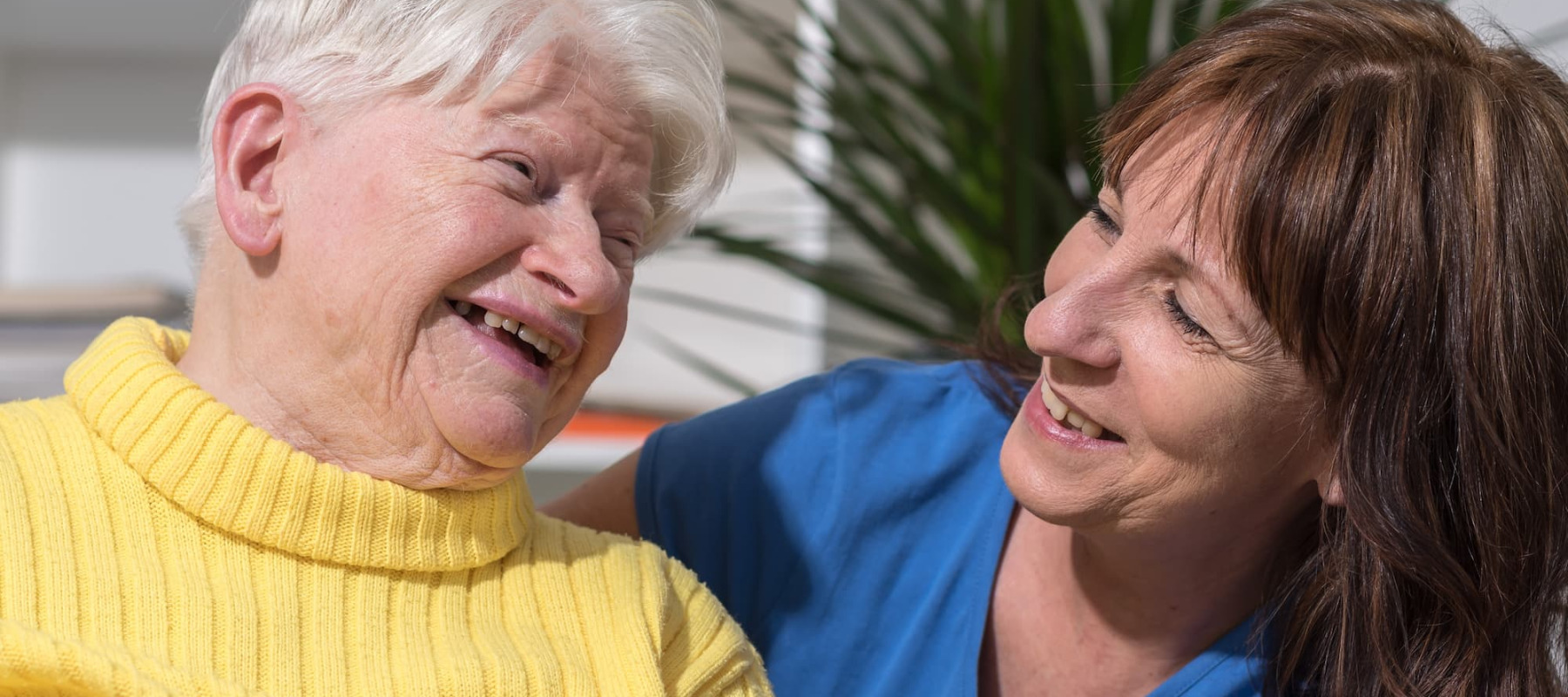 A photo of a woman with her elderly mother