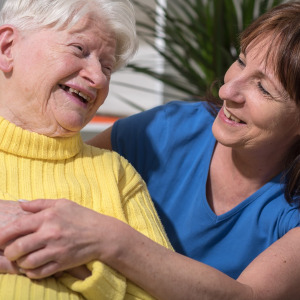 A photo of a woman with her elderly mother