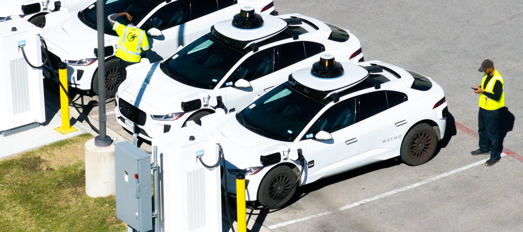 Workers at a Waymo depot in Austin, Texas.
