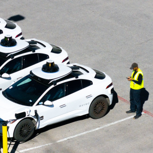 Workers at a Waymo depot in Austin, Texas.