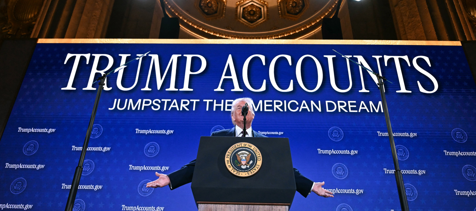 US President Donald Trump delivers remarks on 'Trump Accounts' at the Andrew W. Mellon Auditorium in Washington, DC