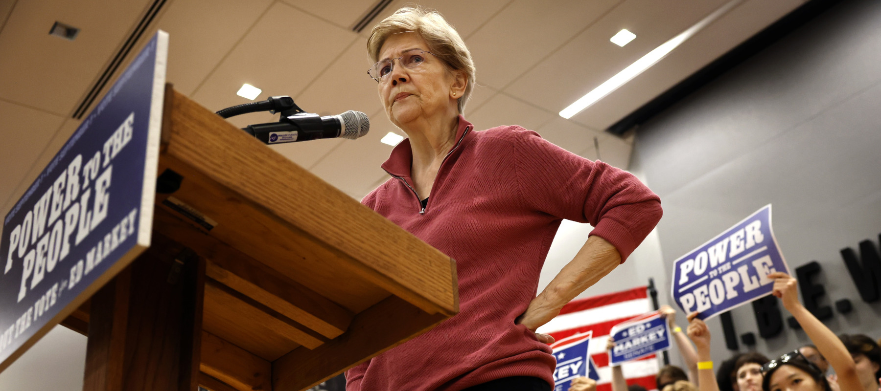 U.S. Senator Elizabeth Warren addresses the crowd during a a 'Power to the People' rally with Senator Ed Markey .
