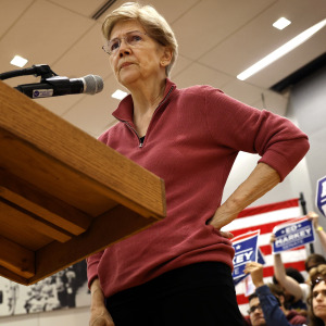 U.S. Senator Elizabeth Warren addresses the crowd during a a 'Power to the People' rally with Senator Ed Markey .