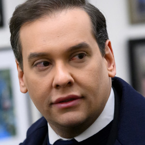 Rep. George Santos, R-NY, walks from his office to the US Capitol in Washington, DC, on December 1, 2023