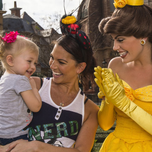 A woman and her daughter meet Princess Belle from Disney's "Beauty and the Beast" at the France pavilion in the Epcot theme park.