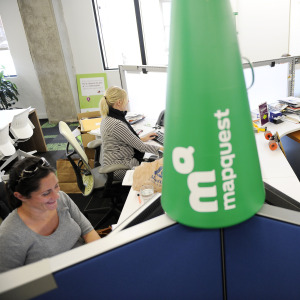 MapQuest employees working away at the company's headquarters in Denver.
