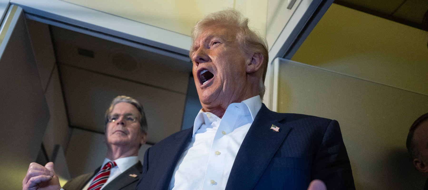 Donald Trump yelling on Air Force One next to Scott Bessent