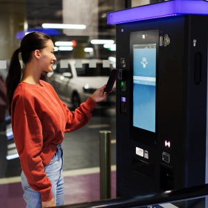 Woman pays for mall parking with her smartphone