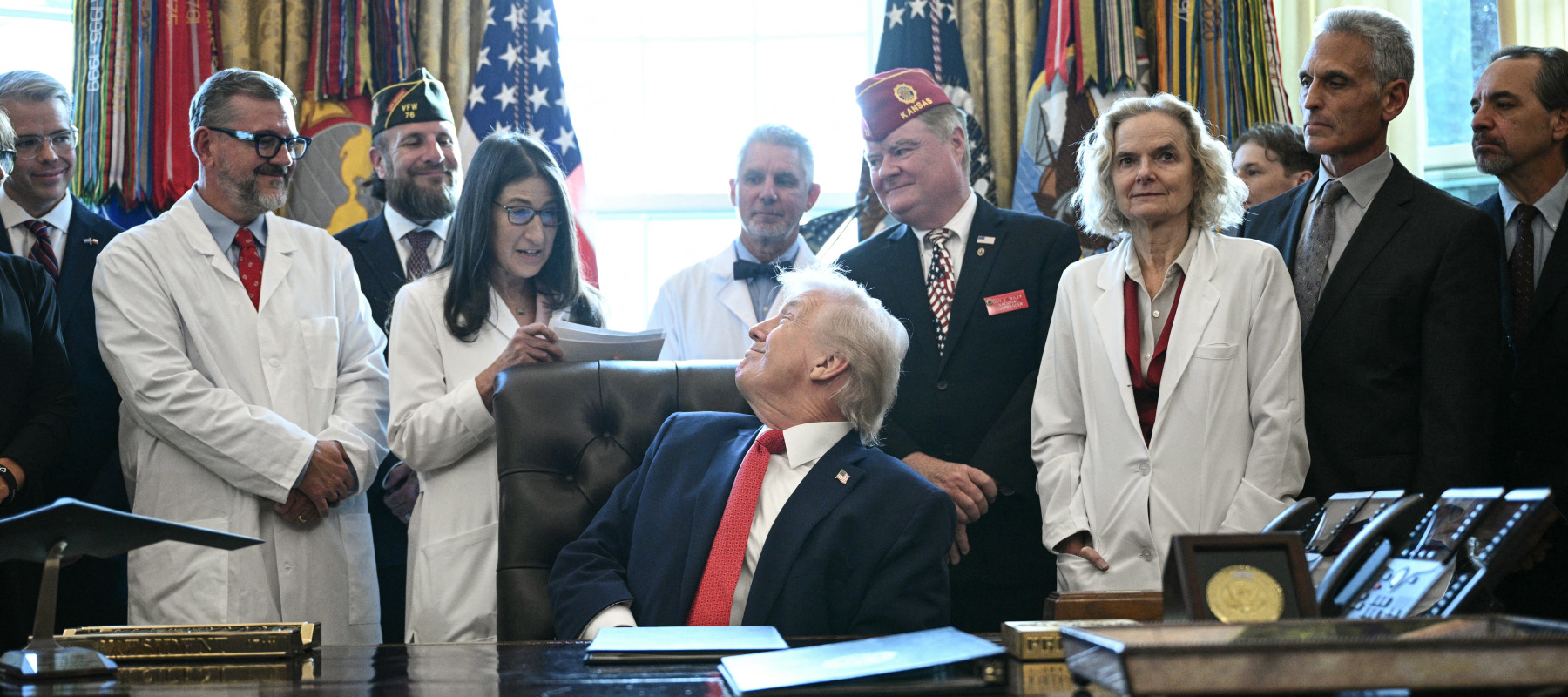 President Trump meets with several doctors inside the Oval Office.