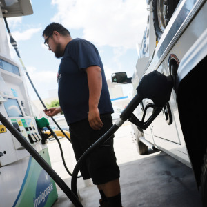 A man fills up his vehicle at a gas station in Brooklyn on June 01, 2026.