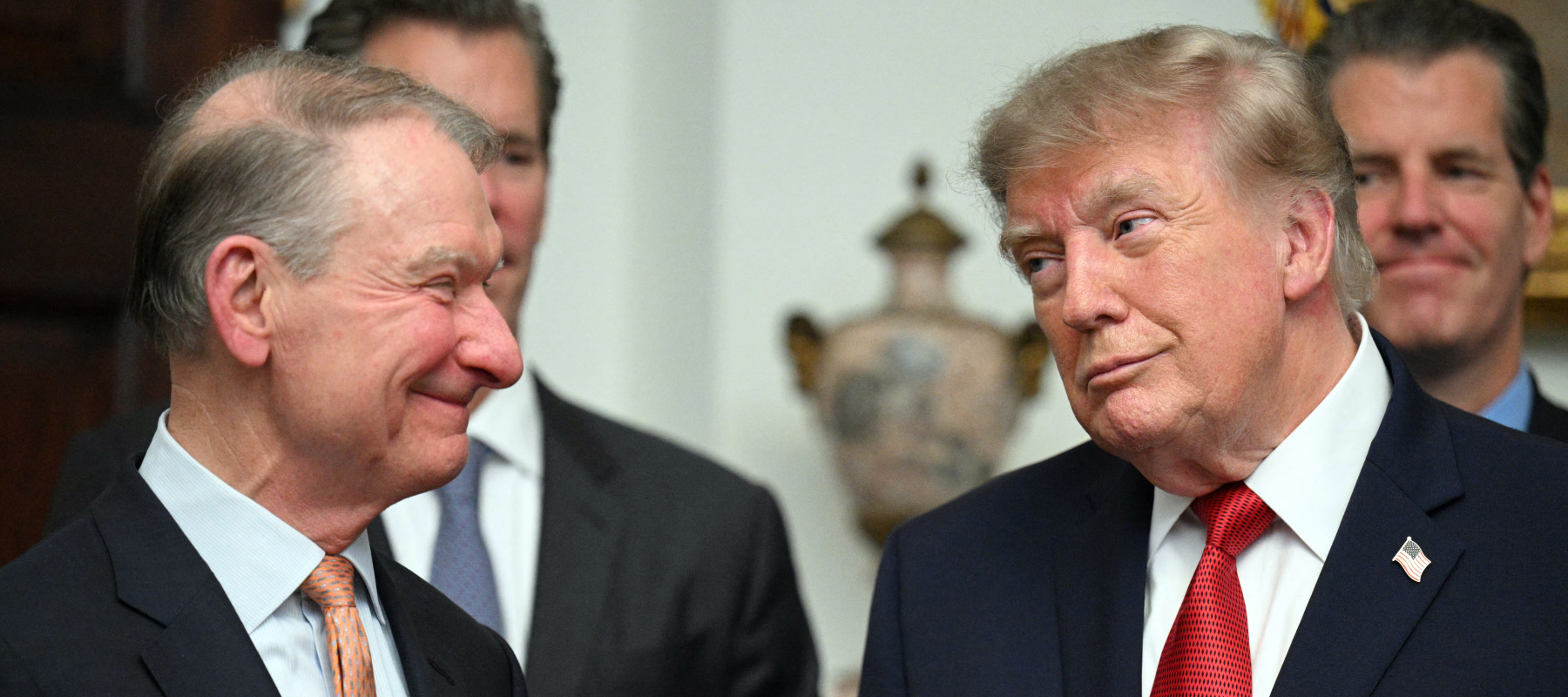 US President Donald Trump speaks with the Chairman of the US Securities and Exchange Commission (SEC) Paul Atkins.