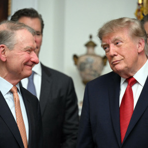 US President Donald Trump speaks with the Chairman of the US Securities and Exchange Commission (SEC) Paul Atkins.