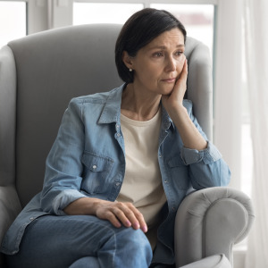 Adult woman grieving.
