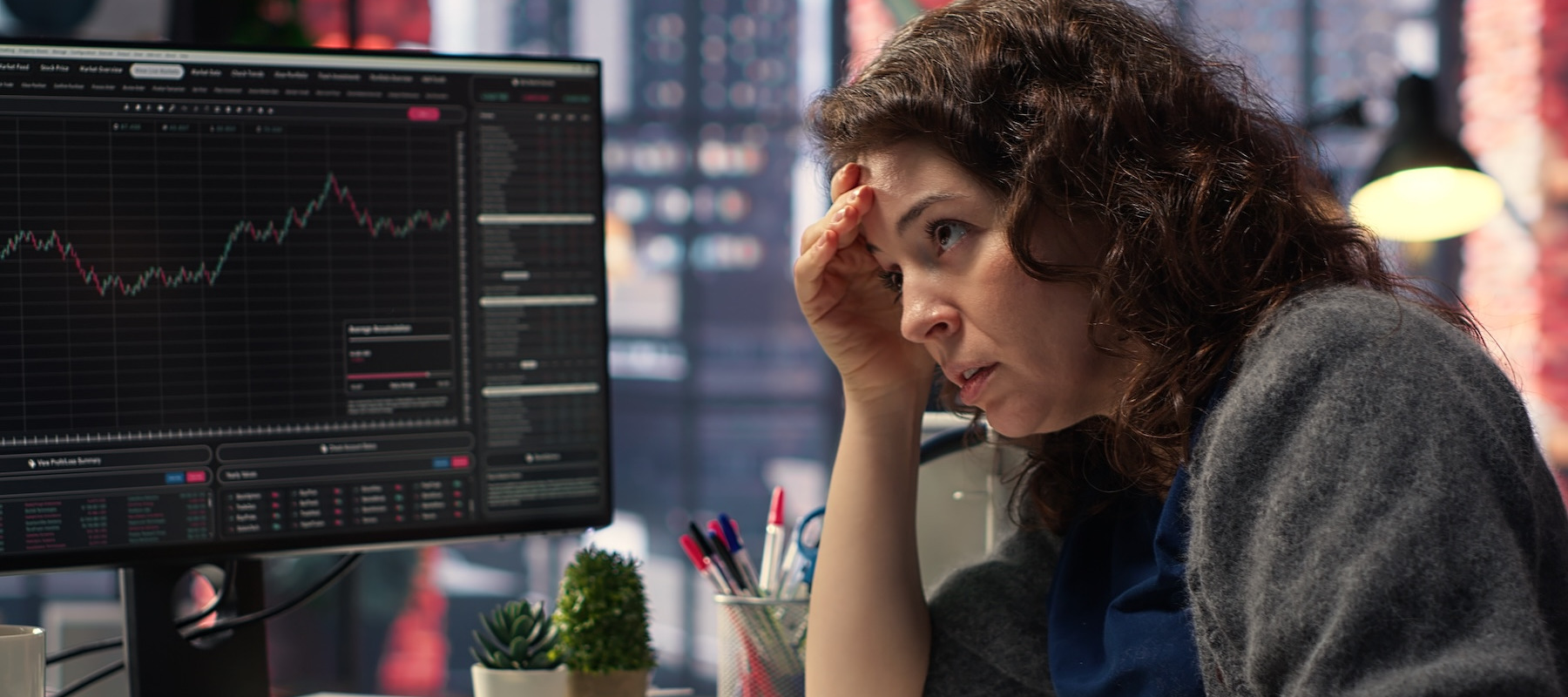 Stressed investor watching the stocks market.