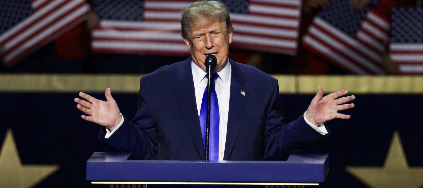 Trump speaks on stage on the first day of the 2026 Republican National Convention.