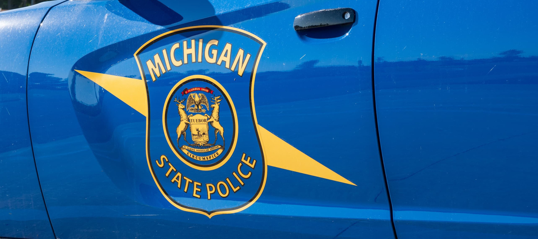 A photo of a Michigan police car