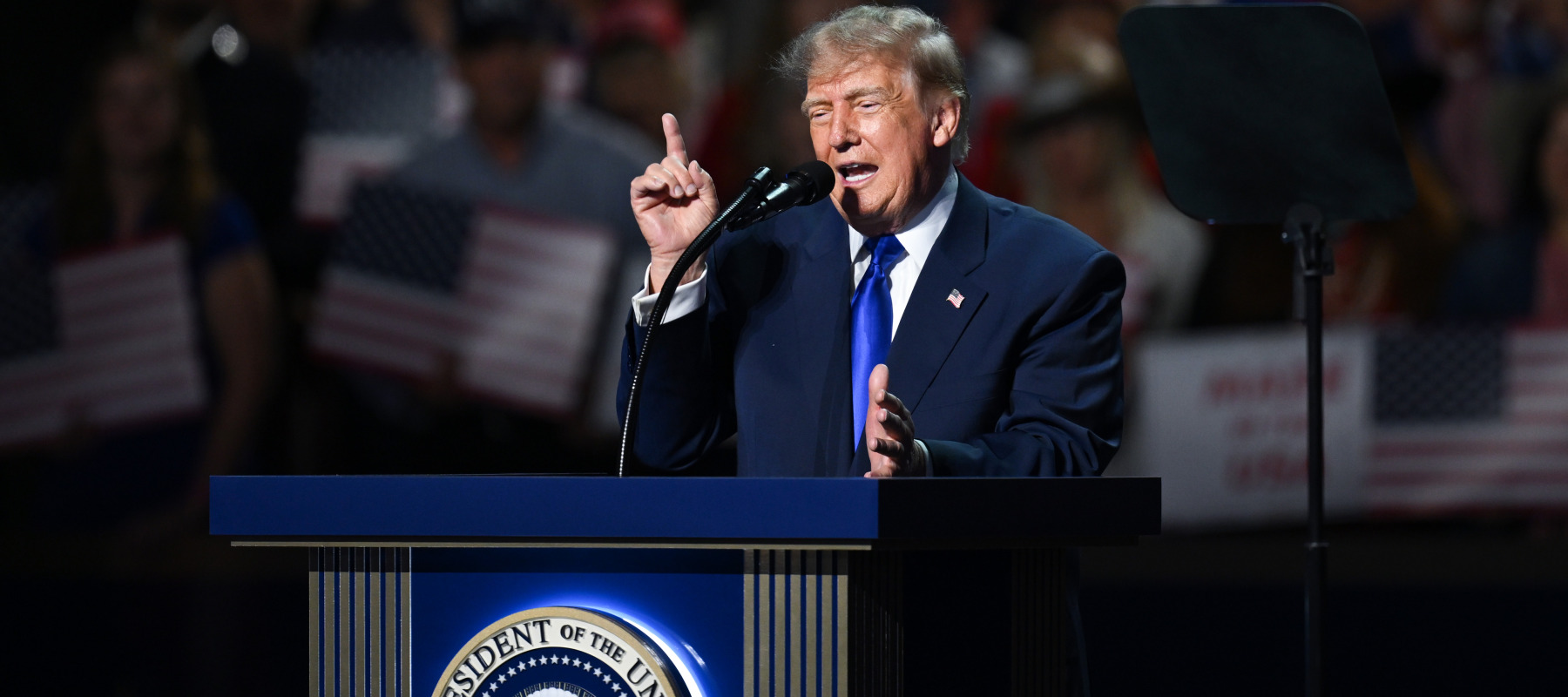 President Trump speaks on stage on the first day of the 2026 Republican National Convention.