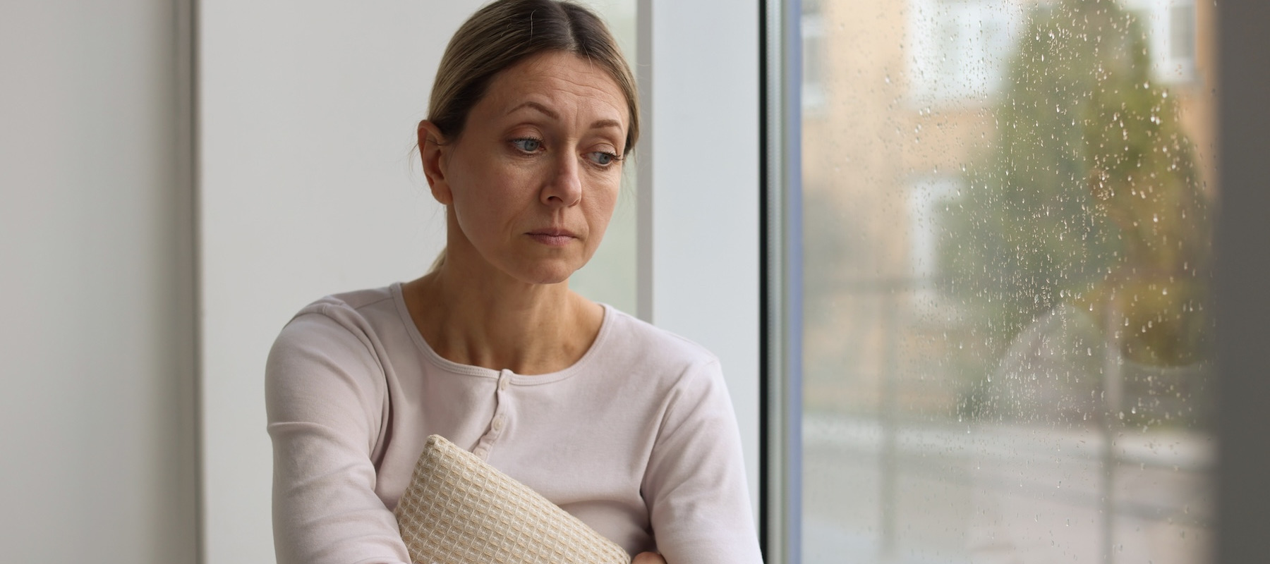 Stressed middle aged woman.