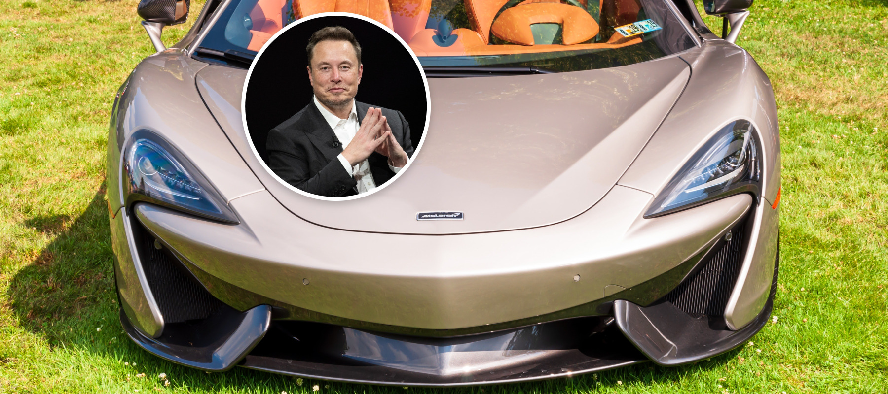 A tan McLaren supercar with Elon Musk in a bubble on top of it