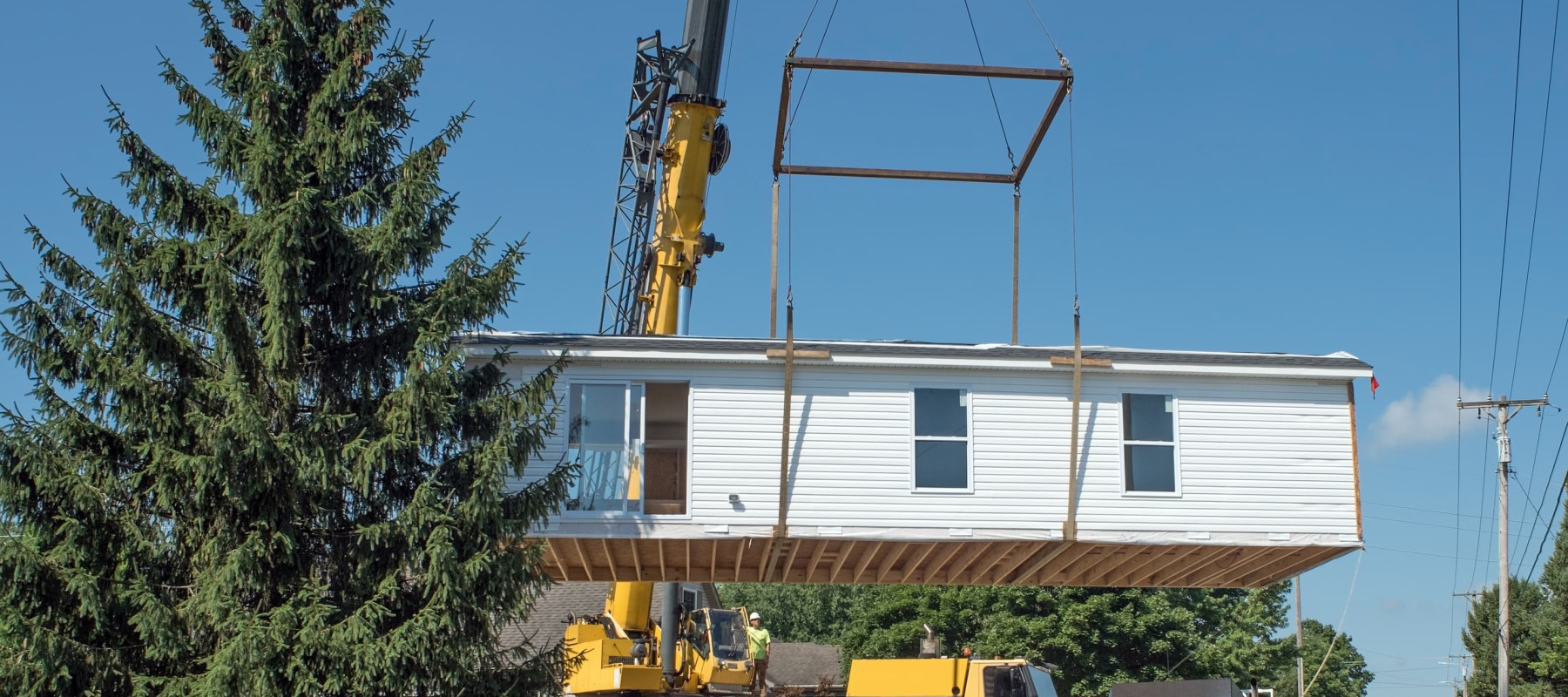 A photo of a manufactured home being placed