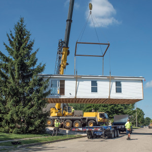 A photo of a manufactured home being placed