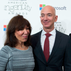 Amazon founder Jeff Bezos surrounded by his parents: Jackie (left) and Mike (right)