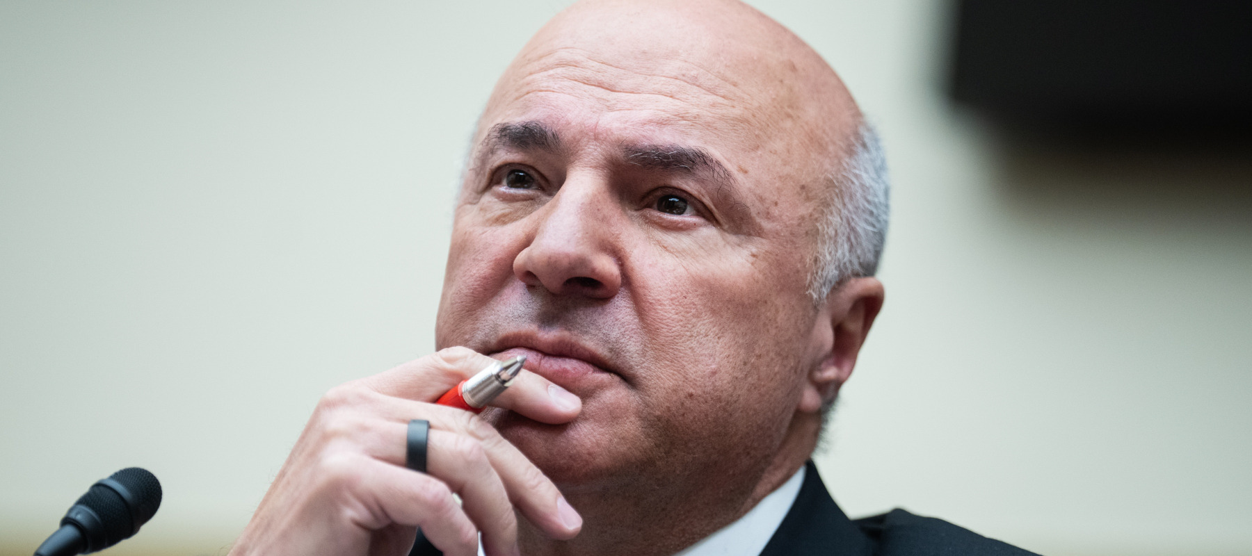 Kevin O'Leary deep in thought during a hearing