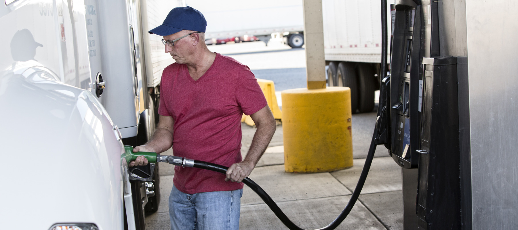 Trucker filling up on gas