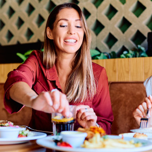 Two women enjoying dinner in a restaurant