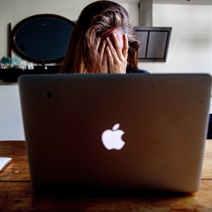 woman covering face