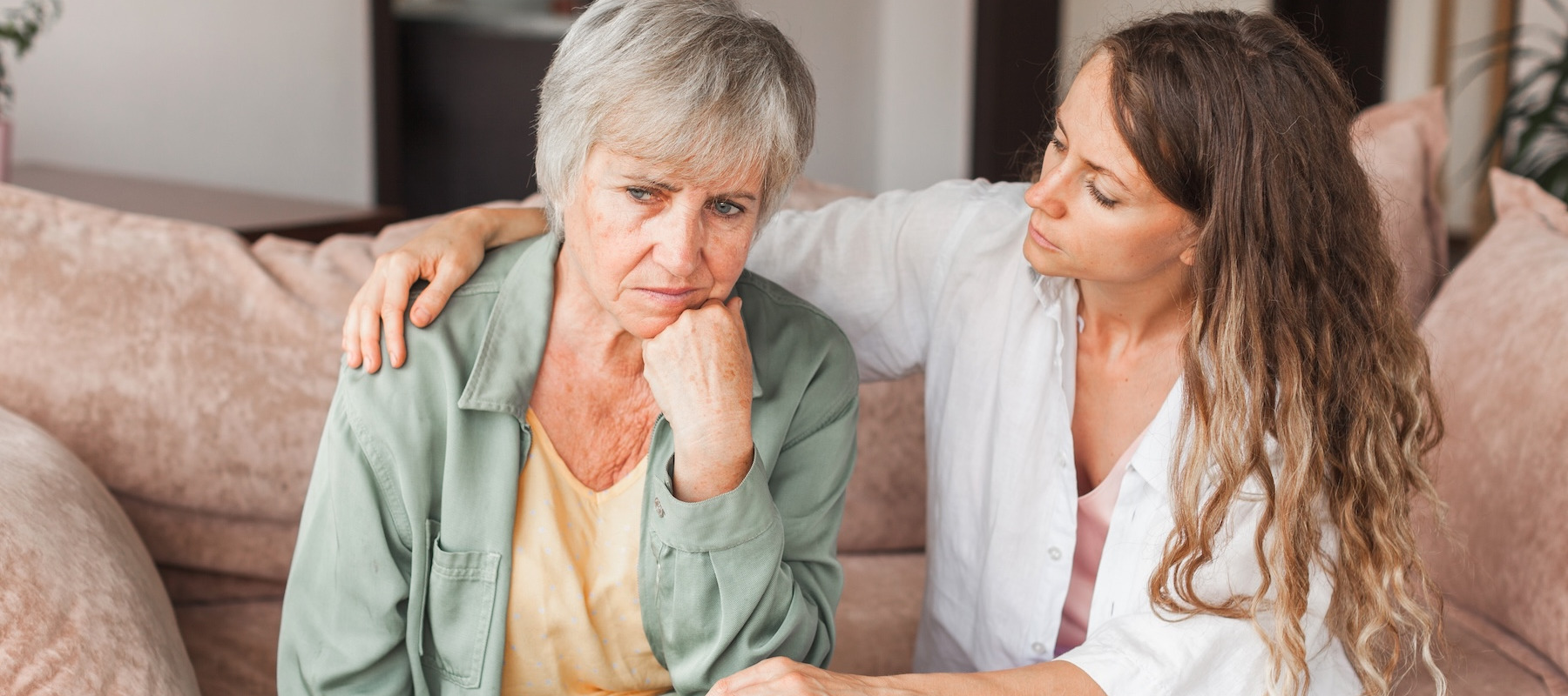 Daughter comforting her stressed mother.