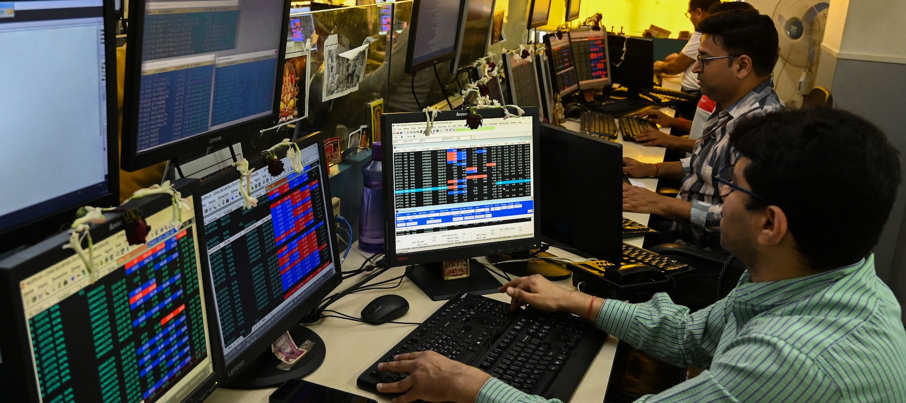 Employee watching the markets.