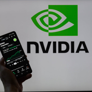 A man looks at NVIDIA's stock market results on his smartphone.