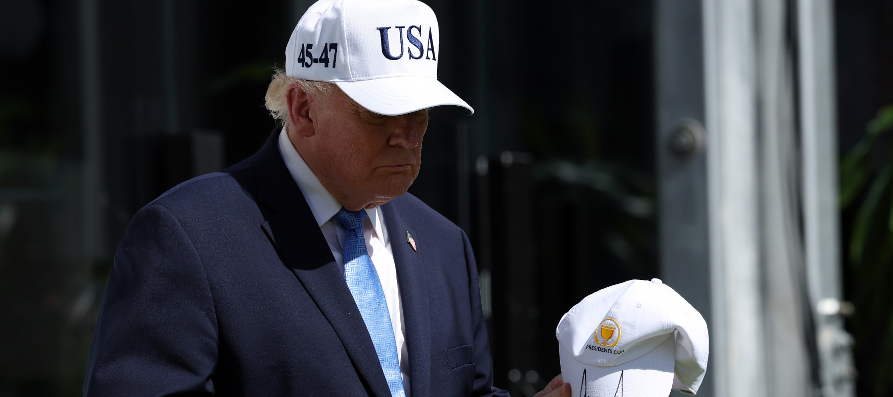 Trump wearing USA ball cap