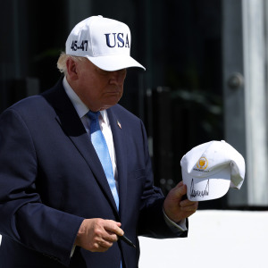 Trump wearing USA ball cap