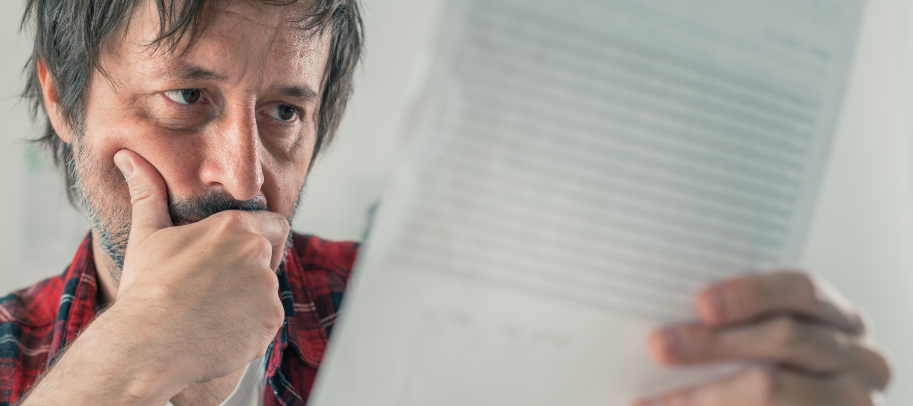 Man reading a letter