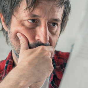 Man reading a letter