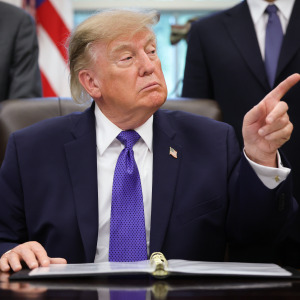 President Trump speaks to reporters in the Oval Office.