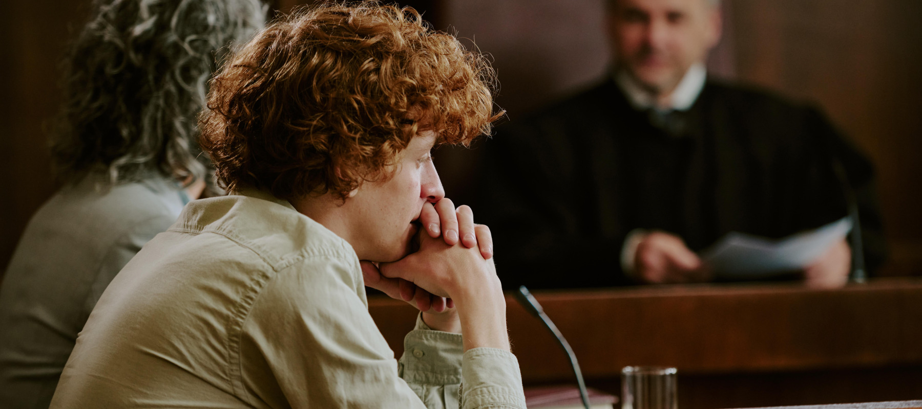 Frustrated young man in court