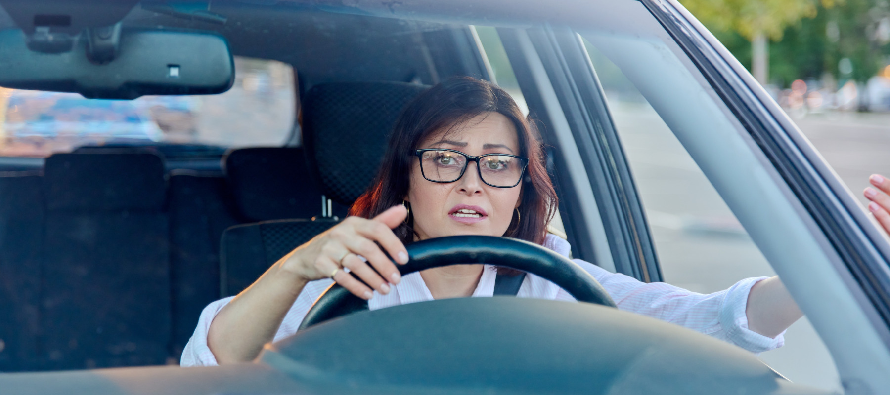 Frustrated woman driving