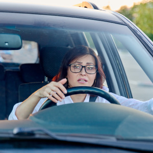 Frustrated woman driving