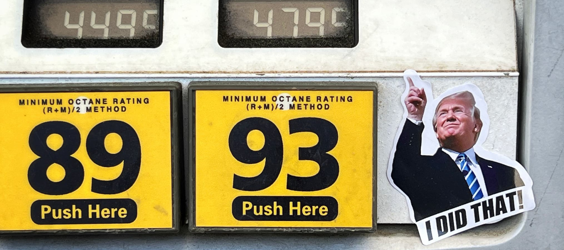A photo of a Donald Trump sticker on a gas pump