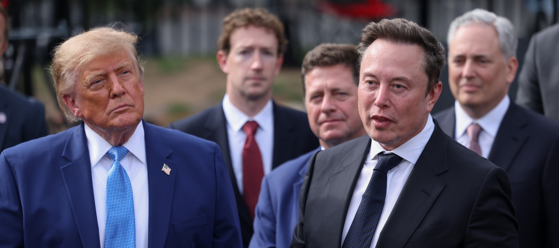 Tesla, X and SpaceX CEO Elon Musk speaks to reporters as US President Donald Trump looks on outside the White House on Sept. 29, 2026 in Washington, at a meeting on super intelligence.