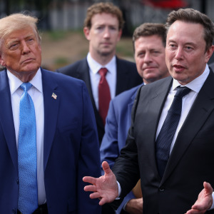 Tesla, X and SpaceX CEO Elon Musk speaks to reporters as US President Donald Trump looks on outside the White House on Sept. 29, 2026 in Washington, at a meeting on super intelligence.