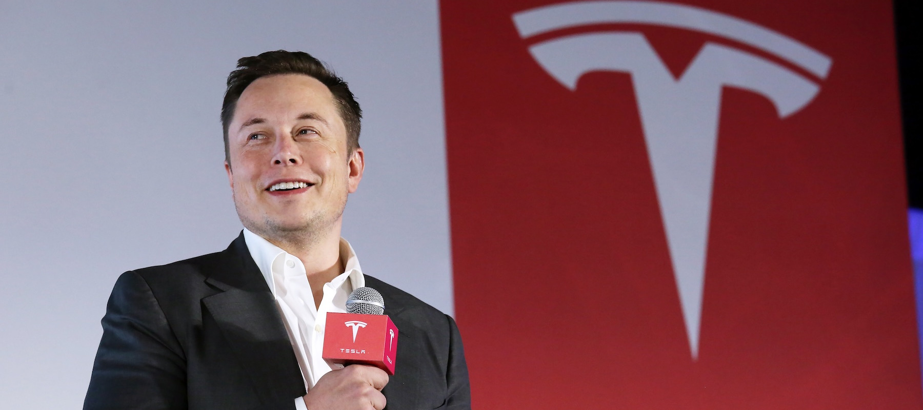 Tesla CEO Elon Musk speaking at an event.