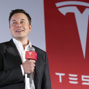 Tesla CEO Elon Musk speaking at an event.