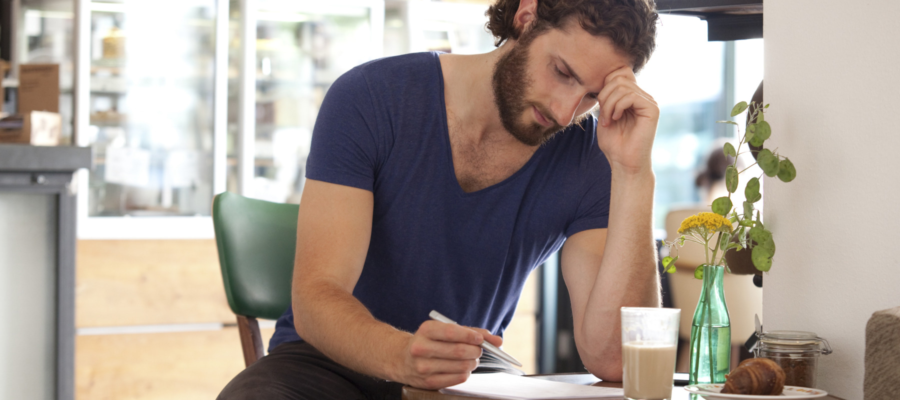 Stressed man at coffee shop