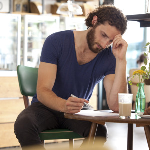 Stressed man at coffee shop